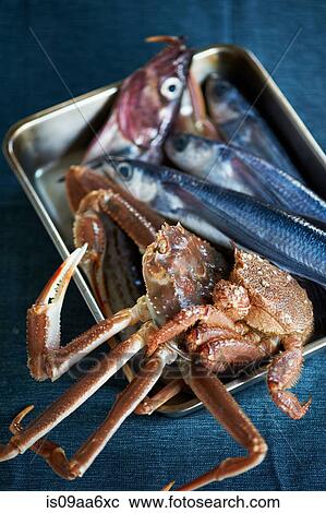 Stock Image - Fresh fish and crab for traditional Japanese dish. Fotosearch