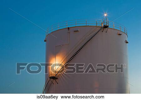 Gas storage tank at dusk, Montreal, Quebec, Canada View Large Photo Image Stock Photo - Gas storage tank at dusk, Montreal, Quebec, Canada. Fotosearch