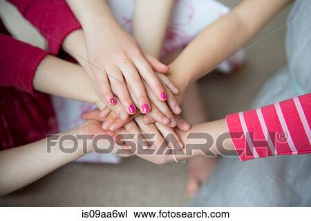 Girls putting hands together, close up View Large Photo Image Stock Image - Girls putting hands together, close up. Fotosearch