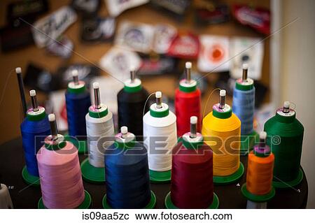 Group of embroidery thread bobbins on machine View Large Photo Image Stock Image - Group of embroidery thread bobbins on machine. Fotosearch