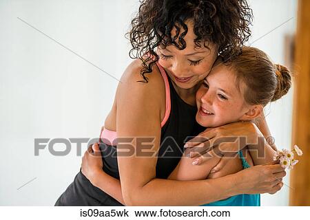 Mature teacher hugging ballerina View Large Photo Image Stock Image - Mature teacher hugging ballerina. Fotosearch