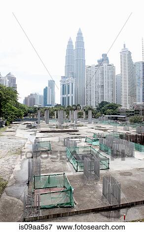 Petronas Towers overlooking building site, Kuala Lumpur, Malaysia View Large Photo Image Stock Photo - Petronas Towers overlooking building site, Kuala Lumpur, Malaysia. Fotosearch