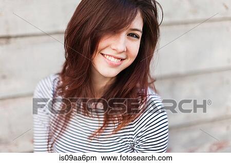 Portrait of a young woman View Large Photo Image Picture - Portrait of a young woman. Fotosearch