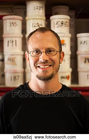 Portrait of small business manager in warehouse View Large Photo Image Stock Image - Portrait of small business manager in warehouse. Fotosearch