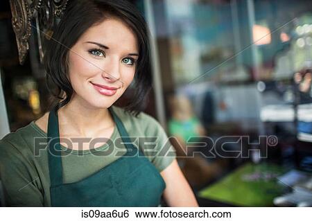 Stock Photograph - Portrait of teenage girl in cafe. Fotosearch