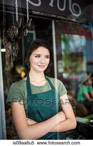 Stock Photography - Portrait of teenage girl through cafe window. Fotosearch