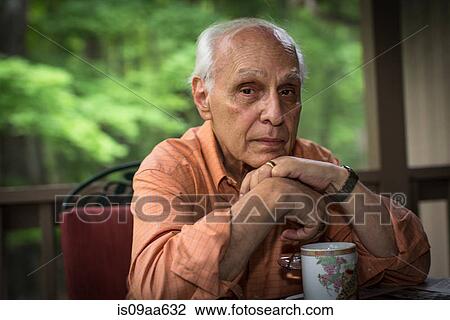 Senior man with hands on chin, portrait View Large Photo Image Stock Image - Senior man with hands on chin, portrait. Fotosearch