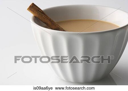 Still life of bowl of drink with cinnamon stick View Large Photo Image Stock Image - Still life of bowl of drink with cinnamon stick. Fotosearch