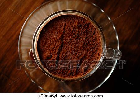 Still life of cup of coffee with chocolate powder View Large Photo Image Stock Image - Still life of cup of coffee with chocolate powder. Fotosearch