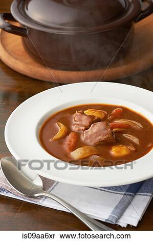 Still life of meat and vegetable casserole in bowl View Large Photo Image Stock Photography - Still life of meat and vegetable casserole in bowl. Fotosearch