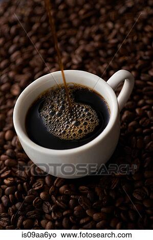 Picture - Still life with black coffee and coffee beans. Fotosearch