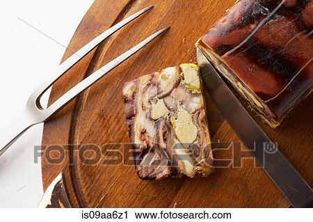 Still life with chopping board and sliced savory roulade View Large Photo Image Stock Image - Still life with chopping board and sliced savory roulade. Fotosearch