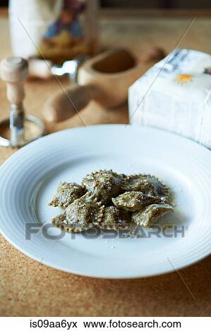 Still life with plate of ravioli View Large Photo Image Stock Photo - Still life with plate of ravioli. Fotosearch