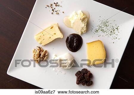 Stock Photo - Still life with selection of cheeses. Fotosearch