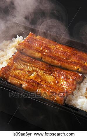 Stock Photography - Still life with steamed white rice and fish. Fotosearch