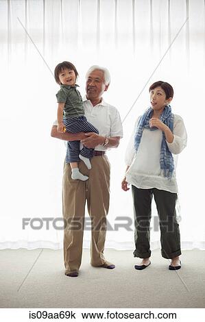 Three generation family, portrait View Large Photo Image Stock Image - Three generation family, portrait. Fotosearch