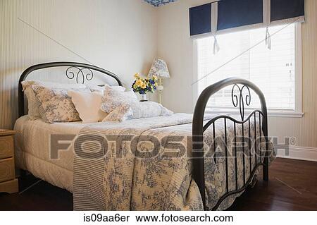 Traditionally styled bedroom with window blinds View Large Photo Image Stock Photography - Traditionally styled bedroom with window blinds. Fotosearch