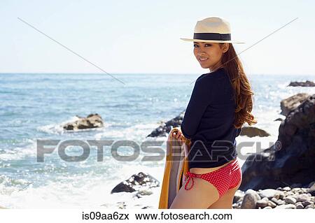 Stock Photo - Young woman enjoying beach, Palos Verdes, California, USA. Fotosearch