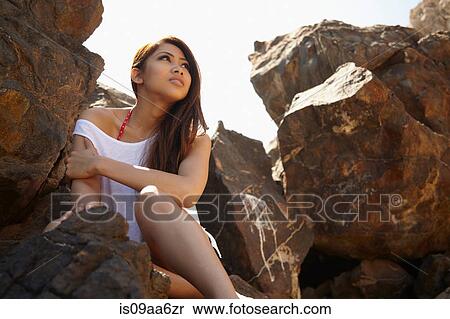 Young woman in rocky shade, Palos Verdes, California, USA View Large Photo Image Stock Photography - Young woman in rocky shade, Palos Verdes, California, USA. Fotosearch