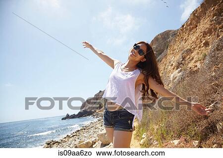 Picture - Young woman on beach, Palos Verdes, California, USA. Fotosearch