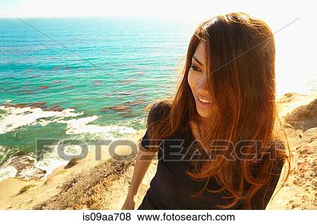 Young woman on cliff path, Palos Verdes, California, USA View Large Photo Image Stock Photo - Young woman on cliff path, Palos Verdes, California, USA. Fotosearch