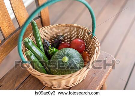 Stock Image - Basket of assorted vegetables. Fotosearch