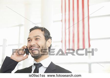 Businessman making phonecall View Large Photo Image Stock Photograph - Businessman making phonecall. Fotosearch