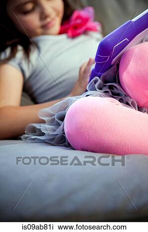 Child using digital tablet View Large Photo Image Stock Image - Child using digital tablet. Fotosearch