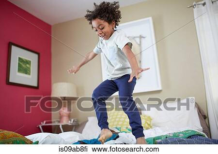 Children jumping on bed View Large Photo Image Stock Image - Children jumping on bed. Fotosearch