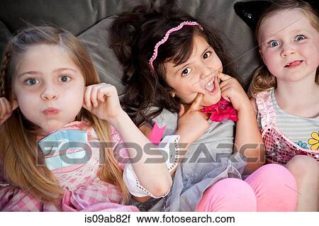 Children making faces View Large Photo Image Stock Image - Children making faces. Fotosearch