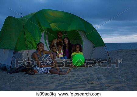 Family with four children in tent on Huntington Beach, California, USA View Large Photo Image Stock Photography - Family with four children in tent on Huntington Beach, California, USA. Fotosearch