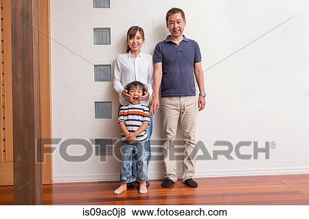 Family with young son making faces View Large Photo Image Stock Photo - Family with young son making faces. Fotosearch