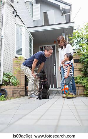 Father with dog talking to son View Large Photo Image Stock Photograph - Father with dog talking to son. Fotosearch