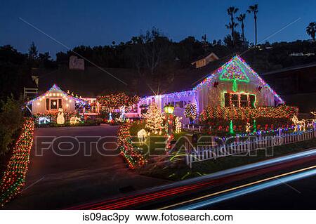 House with abundant exterior Christmas lights View Large Photo Image Stock Photo - House with abundant exterior Christmas lights. Fotosearch