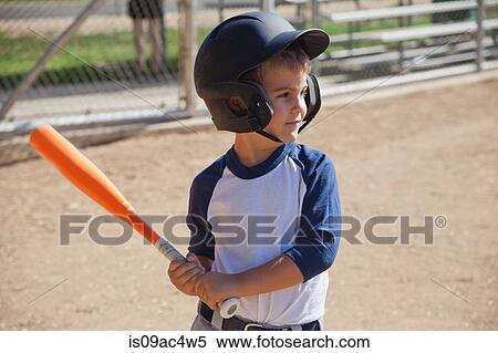 Stock Photography - Little boy playing baseball. Fotosearch