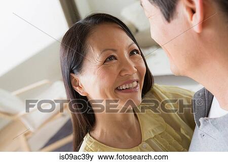 Mature couple, woman smiling View Large Photo Image Stock Photo - Mature couple, woman smiling. Fotosearch