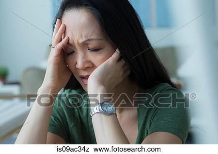 Mature woman with head in hands View Large Photo Image Stock Photo - Mature woman with head in hands. Fotosearch