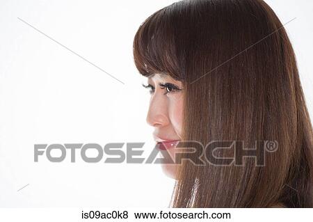 Portrait of brunette woman looking away View Large Photo Image Stock Photo - Portrait of brunette woman looking away. Fotosearch