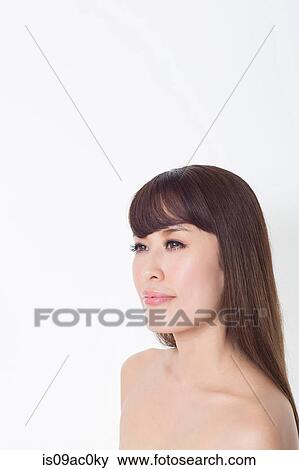 Portrait of brunette woman looking away View Large Photo Image Stock Photo - Portrait of brunette woman looking away. Fotosearch