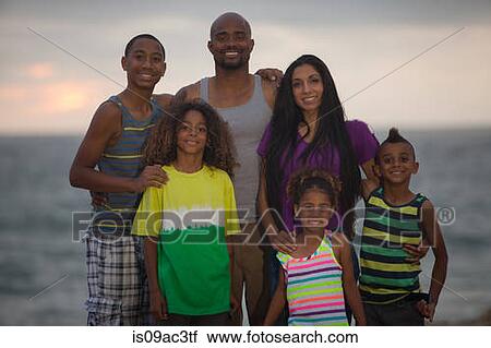 Stock Image - Portrait of family with four children. Fotosearch