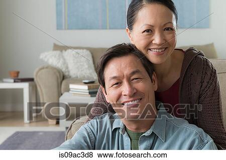 Stock Photo - Portrait of mature couple smiling. Fotosearch