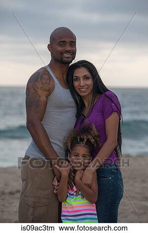 Portrait of mother and father with daughter View Large Photo Image Picture - Portrait of mother and father with daughter. Fotosearch