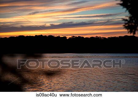 Scenic view of lake in evening, Bath, Maine, USA View Large Photo Image Stock Photograph - Scenic view of lake in evening, Bath, Maine, USA. Fotosearch