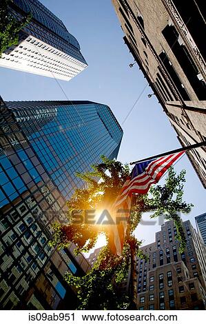 Skyscrapers and American flag, New York, New York State, USA View Large Photo Image Stock Image - Skyscrapers and American flag, New York, New York State, USA. Fotosearch