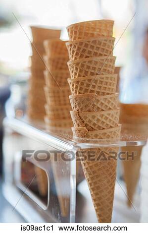 Stock Image - Stacks of ice cream cones. Fotosearch