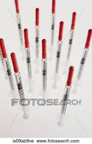 Syringes in upright position View Large Photo Image Stock Image - Syringes in upright position. Fotosearch