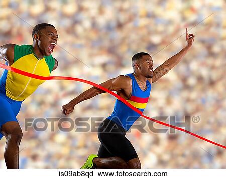 Stock Image - Two athletes reaching finishing line. Fotosearch