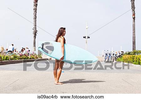 Woman with surfboard, Hermosa Beach, California, USA View Large Photo Image Stock Image - Woman with surfboard, Hermosa Beach, California, USA. Fotosearch