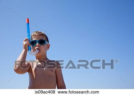 Young boy with snorkel and goggles View Large Photo Image Stock Photo - Young boy with snorkel and goggles. Fotosearch