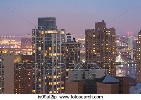 Cityscape and Triborough bridge at dusk, New York City, USA View Large Photo Image Stock Photography - Cityscape and Triborough bridge at dusk, New York City, USA. Fotosearch